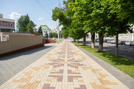 A beautiful and clean street inTiraspol, Transnistria or Moldova, on a sunny summer day.の写真素材