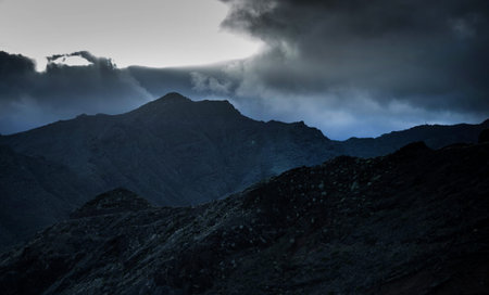 Dramatic clouds over the mountains in the Pyrenees, Spainの写真素材