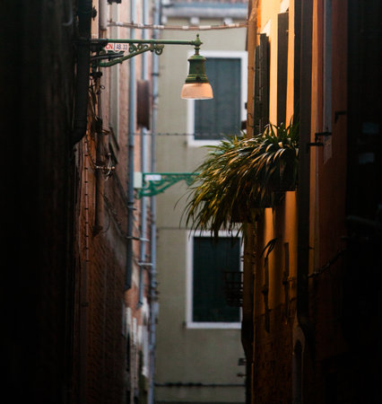 Street lamp in the old town of Bologna, Italy.の写真素材