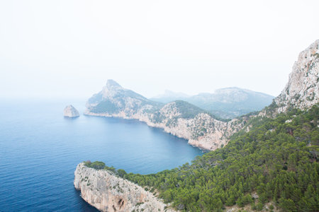 Hiking holidays Mallorca, Spain. Beautiful picture with landscape of Serra de Tramuntana mountains in the island of Majorca in Mediterranean sea. Paradise for bikers.の写真素材