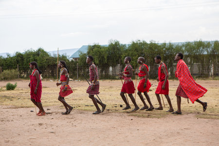 Masai warriors in traditional clothes in Masai Mara, Kenya.のeditorial素材