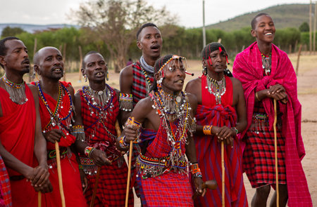 Masai warriors in traditional clothes in Masai Mara, Kenya.のeditorial素材