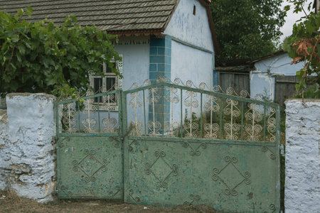 Old gate in a village in the countryside of Transylvaniaの写真素材