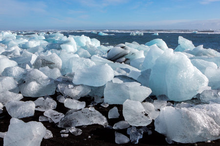 Ice hummocks on the shore of Lake Jokulsarlon, Iceland