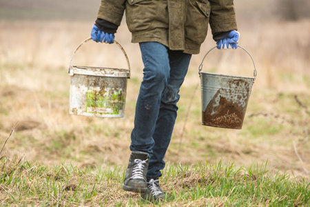 Planting trees. Tree saplings ready to be planted in the beautiful forest. Care for the environmentの写真素材