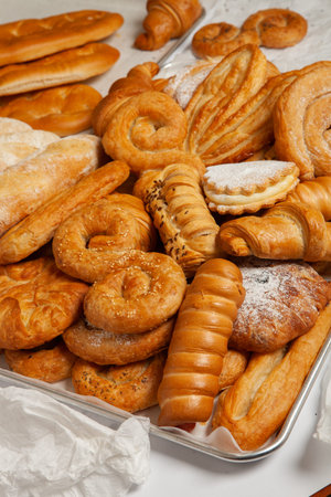 Variety of breads and pastries in a bakery shop.の写真素材
