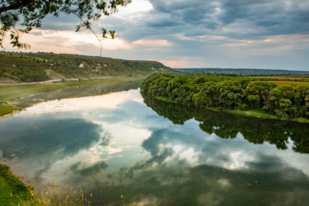 Sunset over the river Dniester in summer, Ukraine