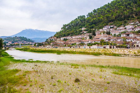 The famous old town of Berat in Albania. Picturesque street with houses from the Ottoman era. Beautiful landscape in central Albania.の写真素材