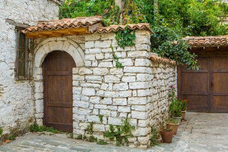 The famous old town of Berat in Albania. Picturesque street with houses from the Ottoman era. Beautiful landscape in central Albania.の写真素材
