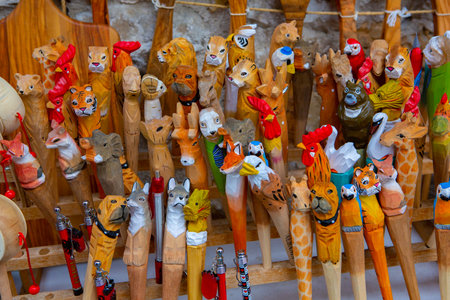 Wooden figurines of animals for sale in a souvenir shopの写真素材