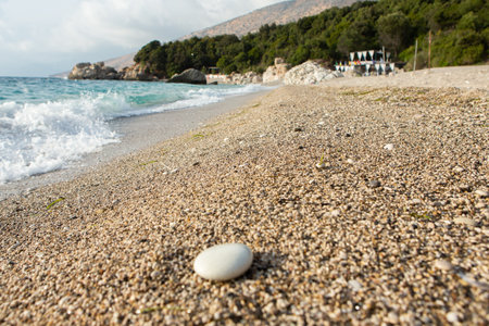 Very beautiful coastline on the Ionian Sea in Albania. The beach with fine sand in the mountains of Albania. Vacation at the sea.の写真素材