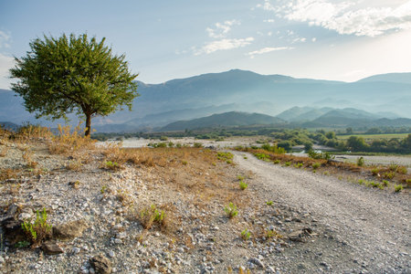 Very beautiful coastline on the Ionian Sea in Albania. The beach with fine sand in the mountains of Albania. Vacation at the sea.の写真素材