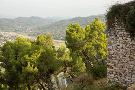 The old town of Berat in Albania. Picturesque street with houses from the Ottoman era. Beautiful landscape in central Albania.の写真素材