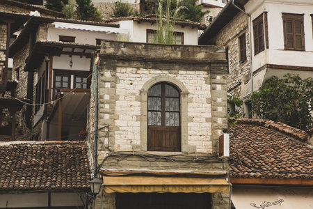 The famous old town of Berat in Albania. Picturesque street with houses from the Ottoman era. Beautiful landscape in central Albania.の写真素材