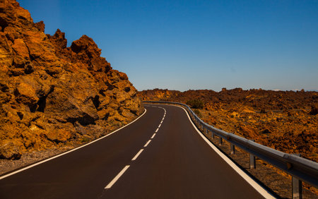 Long Empty Desert Asphalt Road in Canary Islands Spain