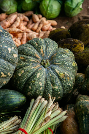 Pumpkin and other vegetables on display at the farmers market.