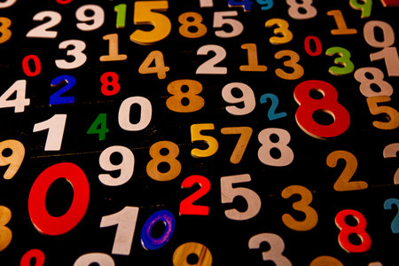 Colorful numbers on a black background. Numbers on a black background.の写真素材