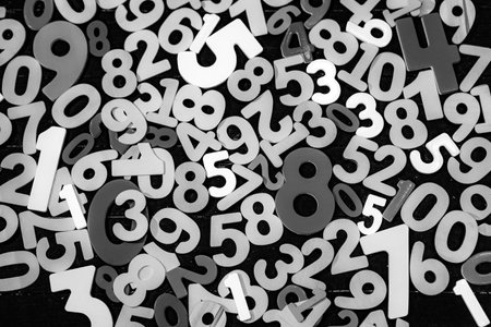 Abstract Mathematical Numbers on a black and white Background. Finance and Data Concept. Futuristic...