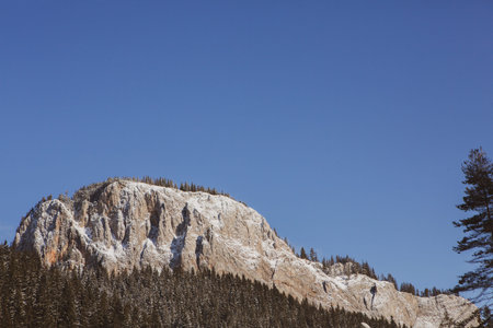Mountain landscape in the Dolomites, Italy. The peaks are covered with snow.