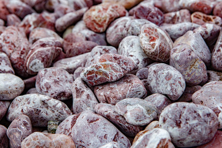 Pile of pebbles on a beach, close-upの写真素材