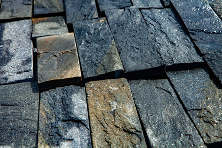 Black slate stone wall texture background close up. Abstract background and texture for design.の写真素材