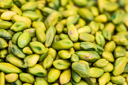 Close up of pistachios in a market stall.の写真素材