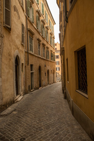 Photo of an empty street with old buildings in Italy.の写真素材