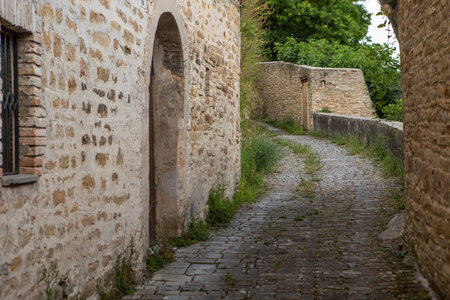 photo of the narrow streets of the medieval Italian town of Serra San Quirico.の写真素材