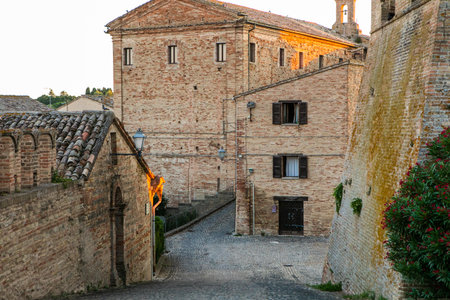 Offagna is a charming medieval hilltop town in central Italyâs Marche region, known for its well-preserved fortress, narrow cobbled streetsの写真素材