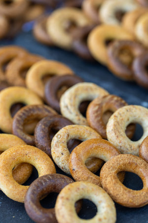 tasty bagels on a black background, shallow depth of field