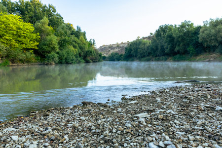 Landscape with river and trees on the shore. Beautiful summer landscape.の写真素材
