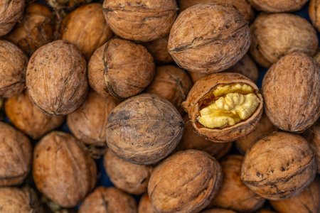 Walnuts on a market stall, close-up. Healthy food backgroundの写真素材
