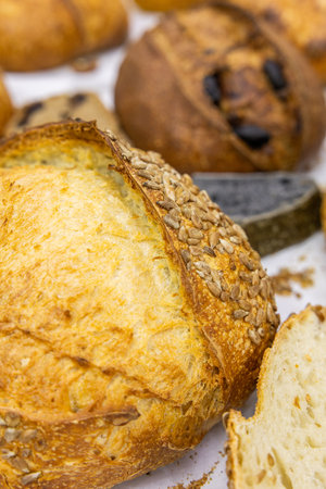 Freshly baked bread with sunflower seeds and sesame seeds.
