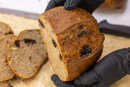 Freshly baked artisan sourdough bread with raisins.