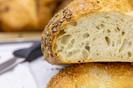 Freshly baked baguette with sesame and sunflower seeds