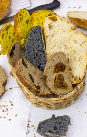 Slices of bread with raisins in a basket.