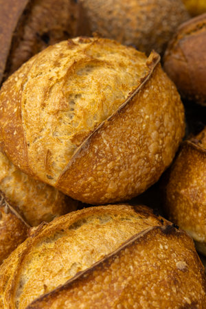 Close-up of a pile of freshly baked baguette breadの写真素材