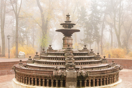Captivating sunrise over fog covered Chisinau, Republic of Moldova, in warm autumn tones.の写真素材