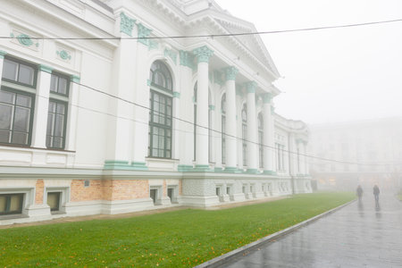 Dreamlike view in fog during sunrise peaceful autumn morning.の写真素材