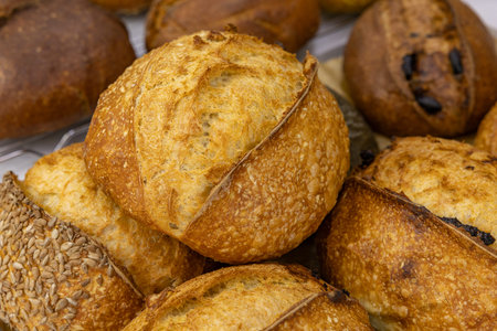 Bread with sesame seeds in a bakery, close-up