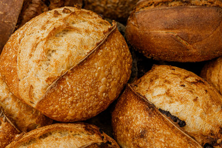 close up of a pile of freshly baked baguette breads
