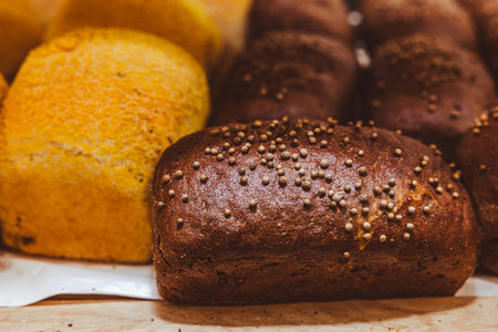 Assortment of fresh baked bread. Bakery concept. Selective focus.の写真素材