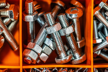 Bolts and nuts in a box close-up macro photography
