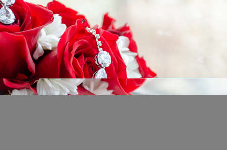 wedding rings on the flowerの写真素材