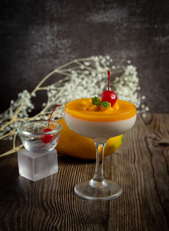 panna cotta with lime and mangoの写真素材