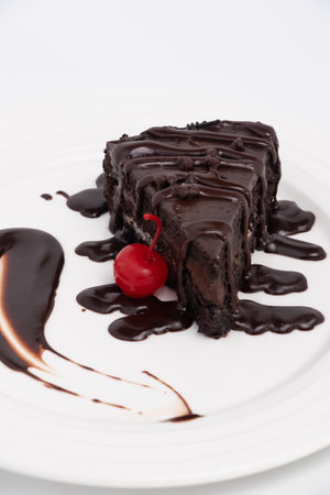 chocolate cake dessert with cherryの写真素材