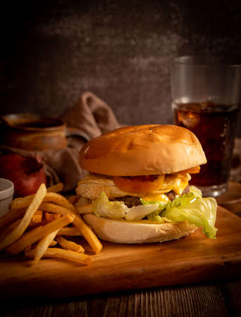 Burger with cheese and vegetableの写真素材