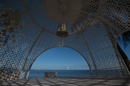 3D rendering of a pavilion on the beach with the sea in the backgroundの写真素材