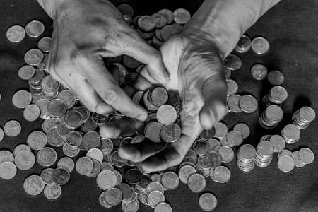 counting coins, coins, penny, centsの写真素材