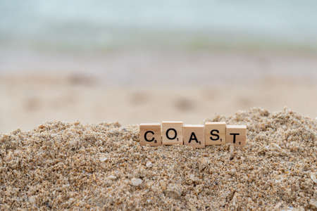 block letters words written on the sand, coastの写真素材